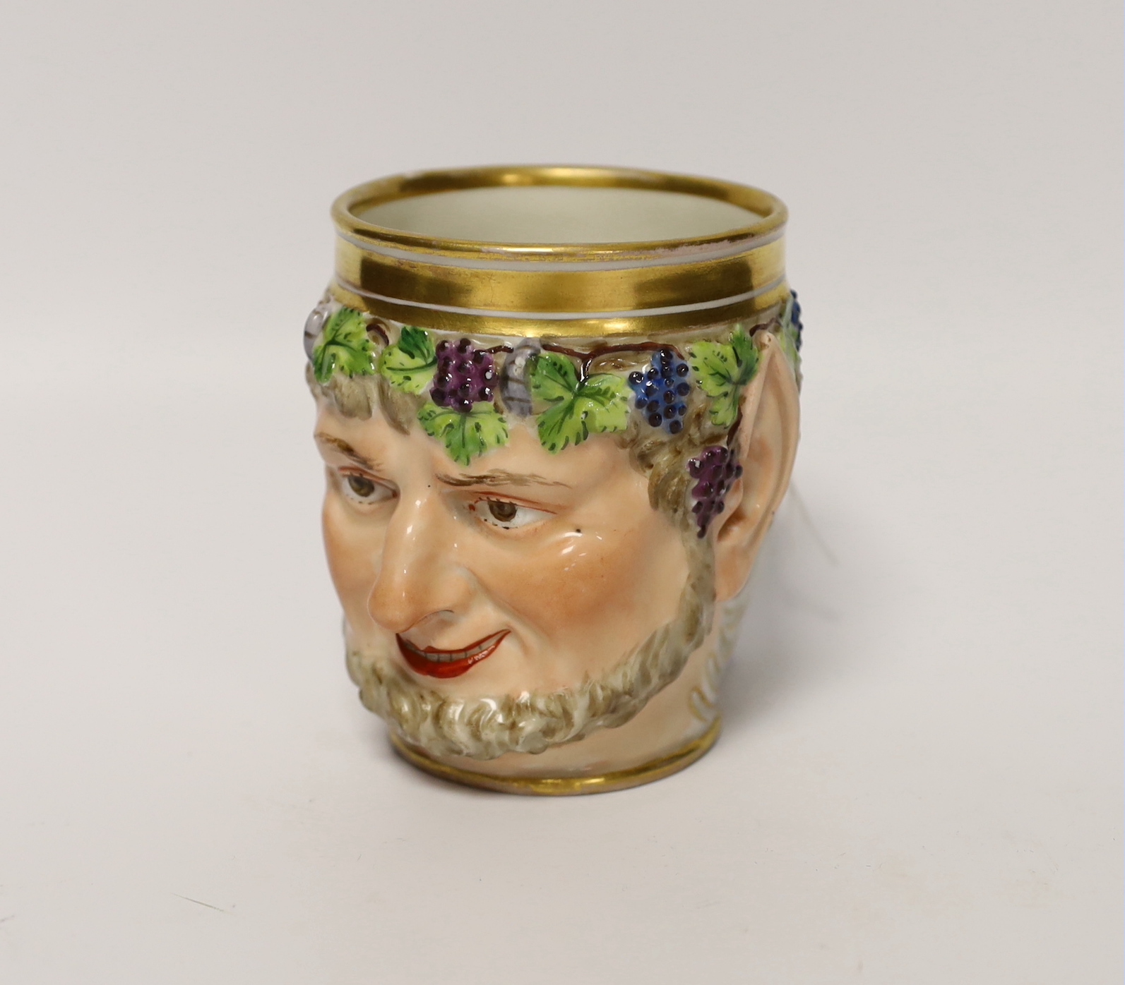 An early 19th century Vienna satyr mug, date code for 1827, 10cm